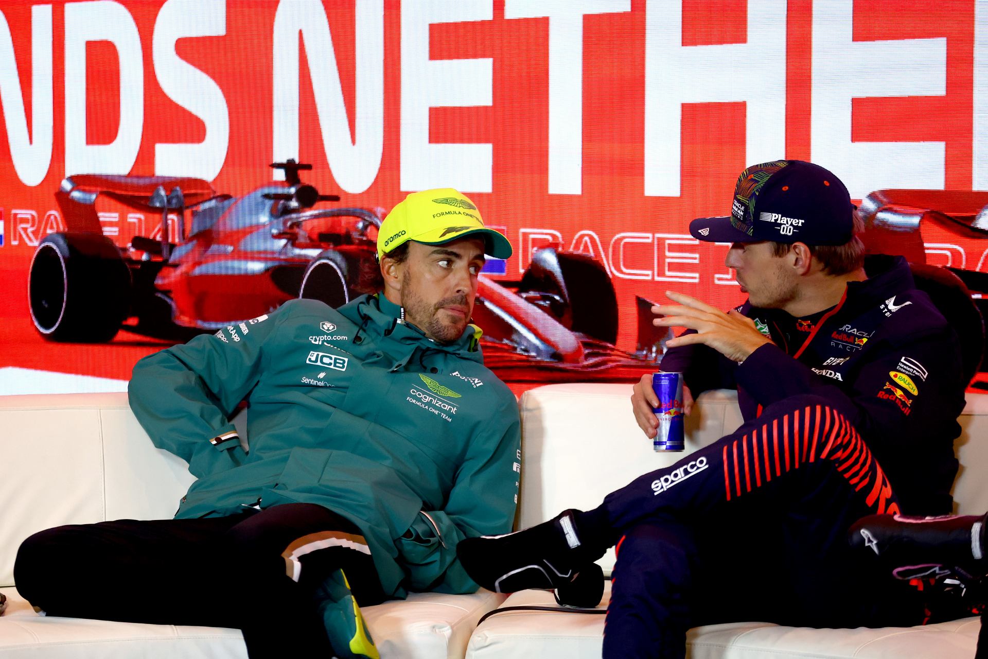 Fernando Alonso and Max Verstappen discussing