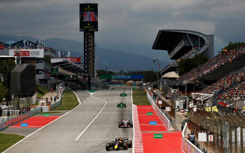 a race track with cars driving on it