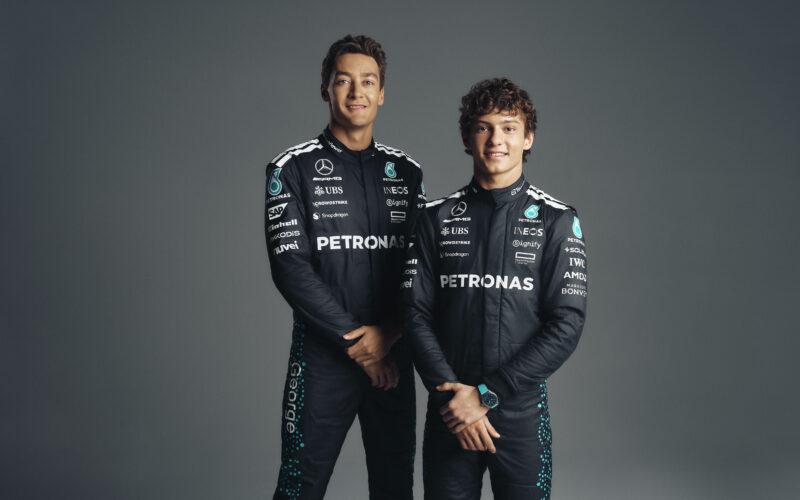 a couple of men standing next to each other